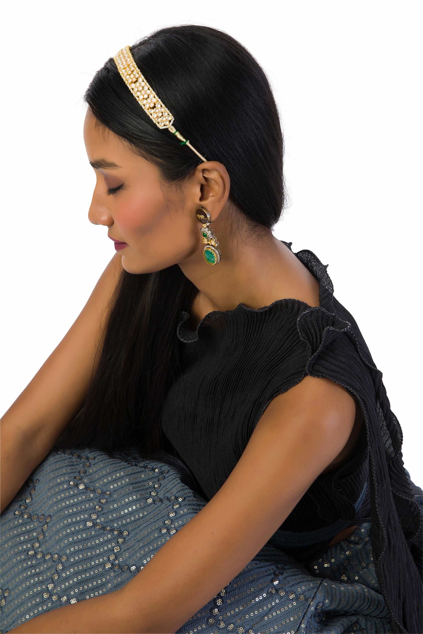 "Grey to Black One-Shoulder Top with Lehenga featuring a textured top, attached dupatta, matching belt, and a fully lined georgette skirt with sequins and thread work."