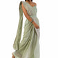 Model wearing an elegant olive green stitch drape saree set with intricate details.