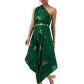 Woman wearing a bottle green one-shoulder draped gown in semi-silk with hand embroidery, paired with a matching belt.