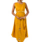 Woman wearing an elegant mustard Mahanadi dress with hand embroidery and a matching belt