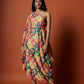 Slub linen satin & soft linen georgette multi printed one shoulder dress with open cowl sleeve and matching belt.