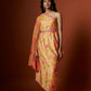 Slub linen satin & soft linen georgette yellow printed one shoulder dress with open cowl sleeve and matching belt.